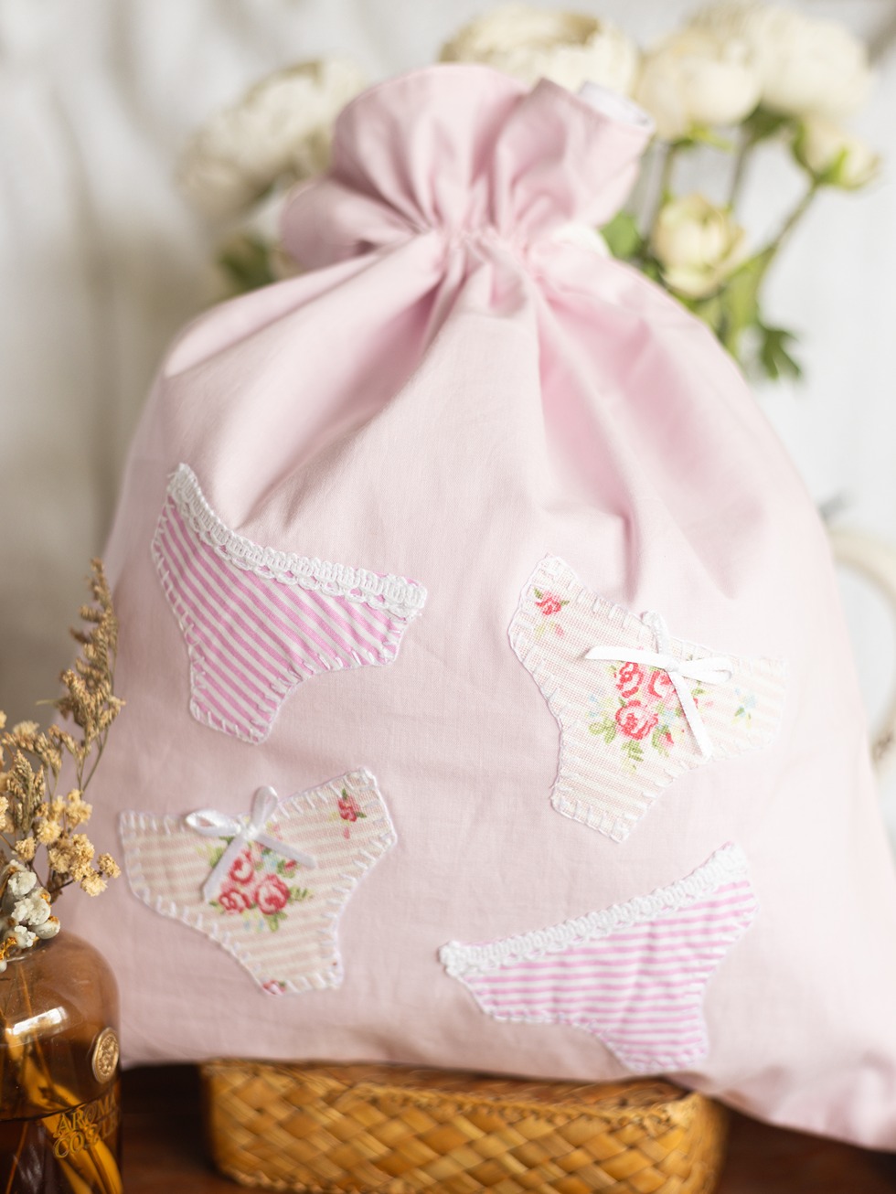 Drawstring Bag - Pastel pink with undergarments hand applique detailing (Size: 12